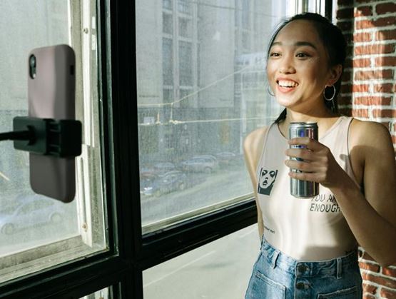 Girl in front of her phone. Image credit: Ivan S - Pexels