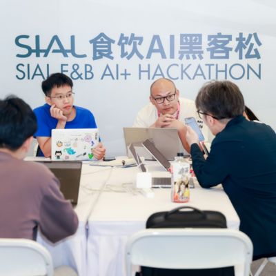 Participants working together at the SIAL F&B AI+ Hackathon, exploring AI-driven innovation for the food and beverage industry.