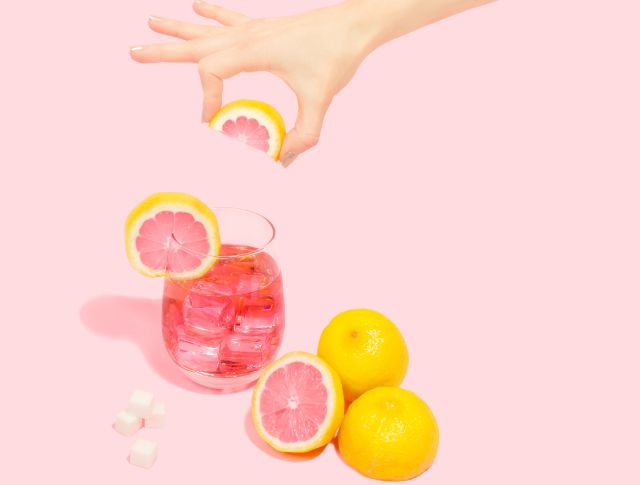 hand pressing lemon pink glass